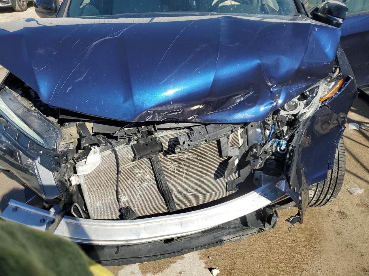 2019 Honda Passport VIN 5FNYF8H5XKB010717 Copart auction photo, front end / side damage thumbnail 12