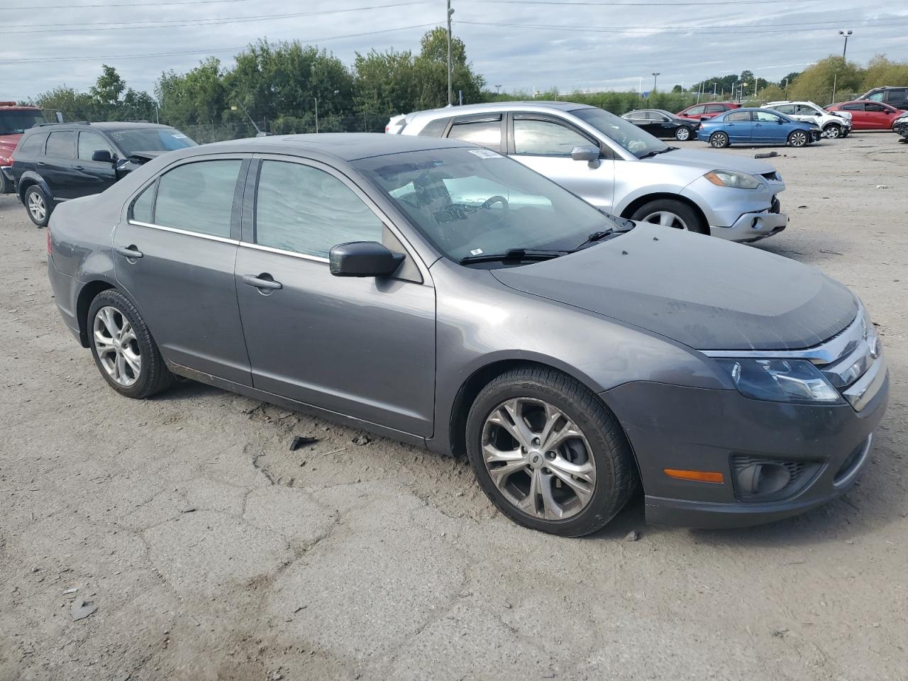 2012 Ford Fusion VIN 3FAHP0HA1CR129337 Copart auction photo, side / minor dent/scratches damage thumbnail 4