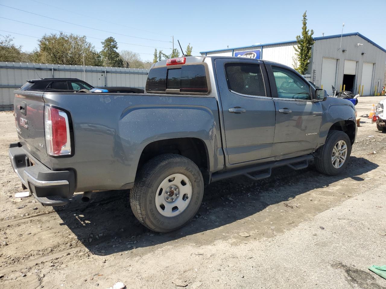 2020 GMC Canyon VIN 1GTG5CENXL1115144 Copart auction photo, side damage thumbnail 3