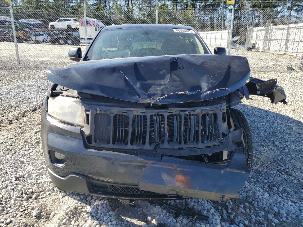2011 Jeep Grand Cherokee VIN 1J4RS5GT4BC569198 Copart auction photo, front end damage thumbnail 5