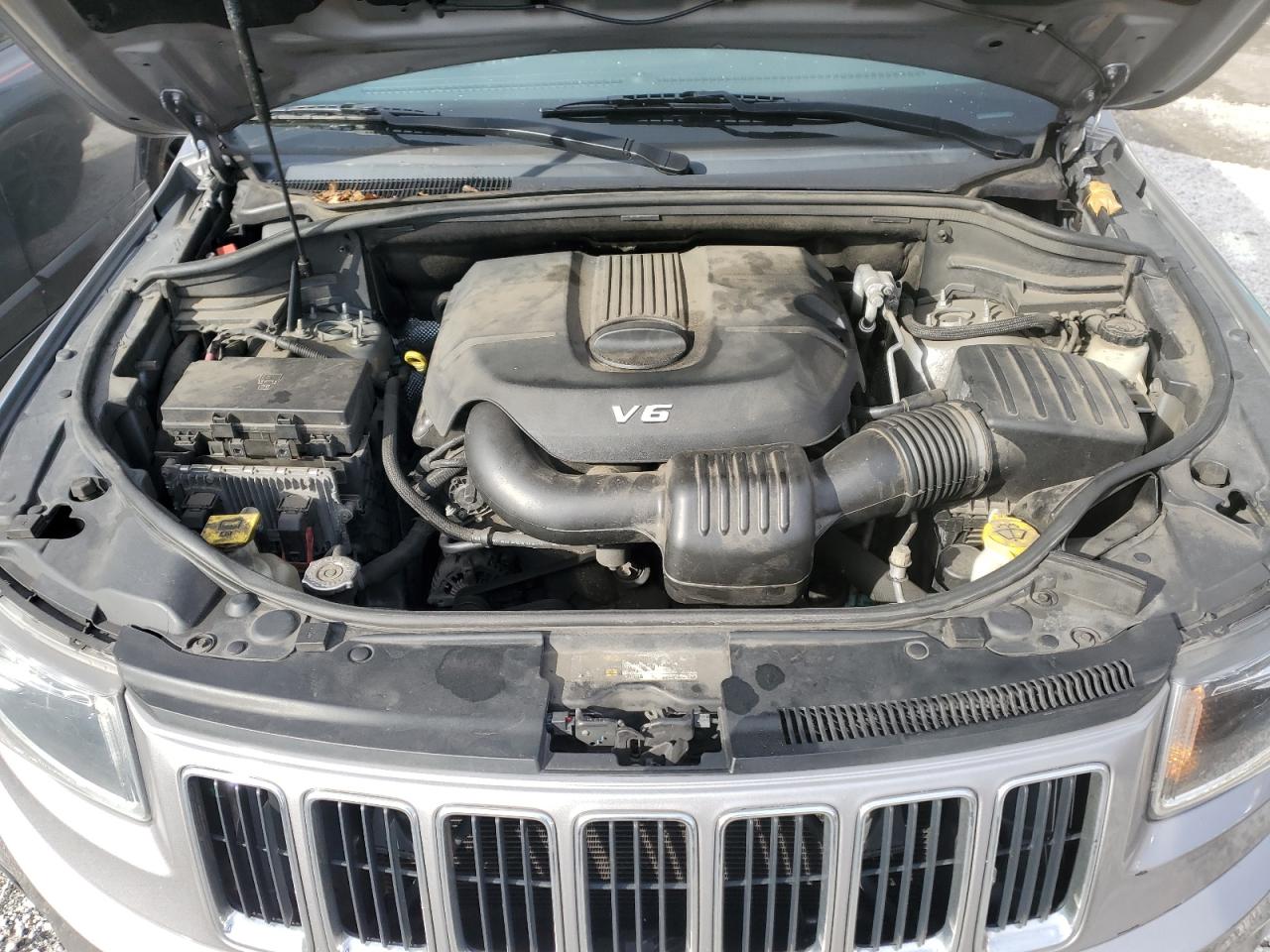 2015 Jeep Grand Cherokee VIN 1C4RJFBG1FC763105 Copart auction photo, rear end / front end damage thumbnail 12