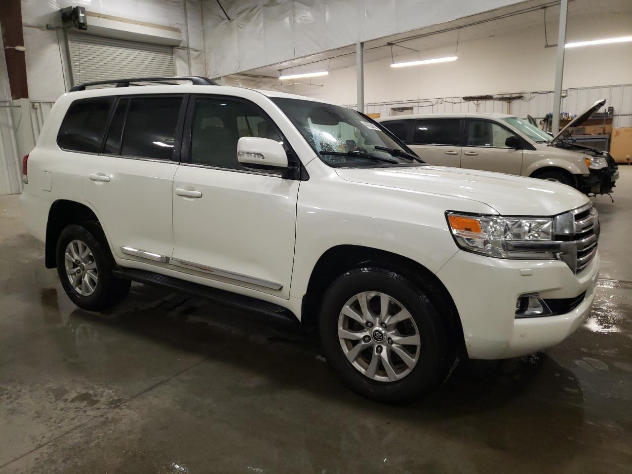 2016 Toyota Land Cruiser VIN JTMCY7AJ8G4043932 Copart auction photo, top/roof / rear end damage thumbnail 4