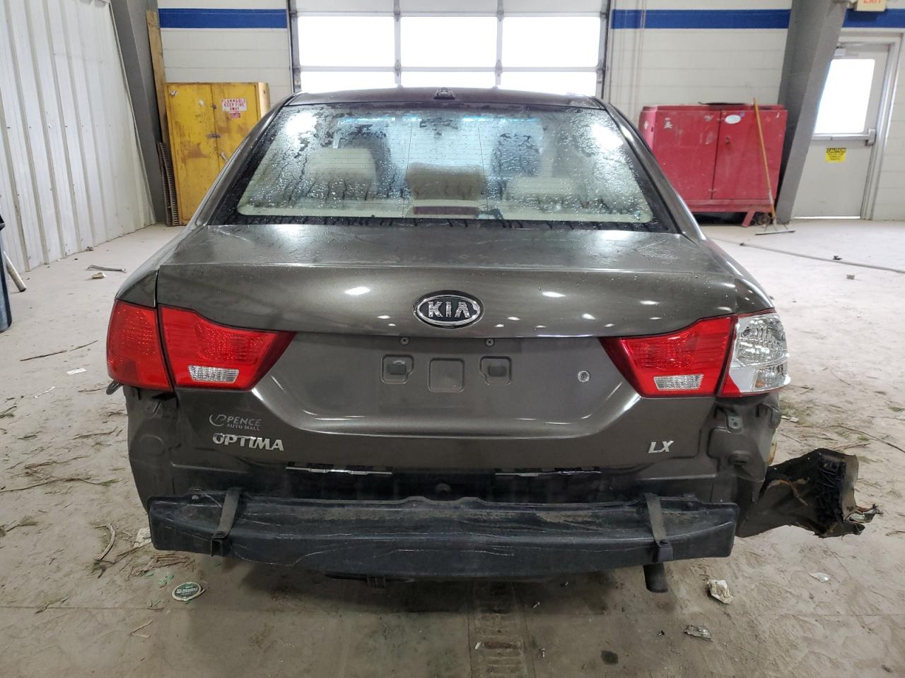 2009 KIA Optima VIN KNAGE228795301098 Copart auction photo, side damage thumbnail 6
