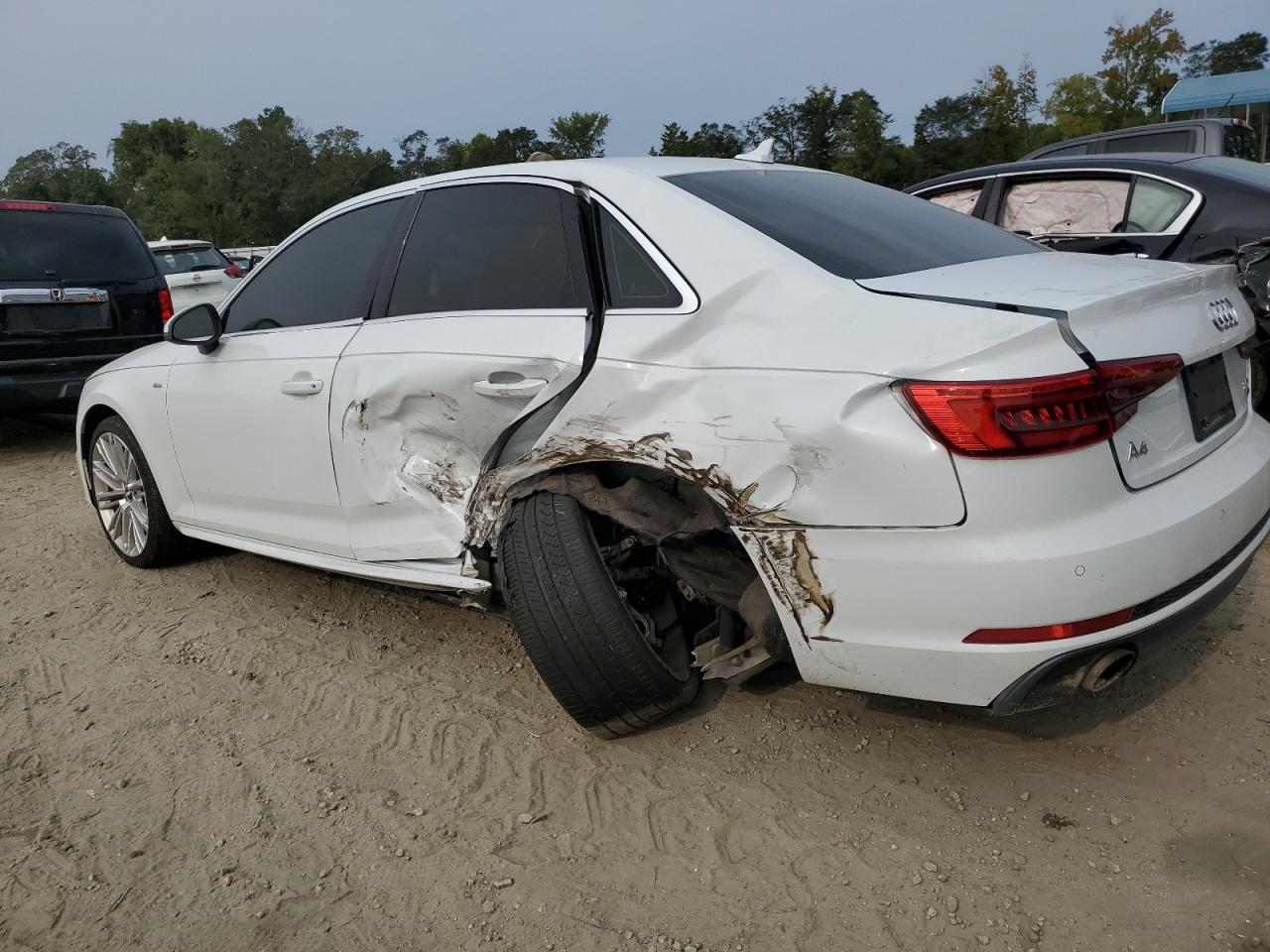 2017 Audi A4 VIN WAUENAF4XHN068048 Copart auction photo, rear end / side damage thumbnail 2