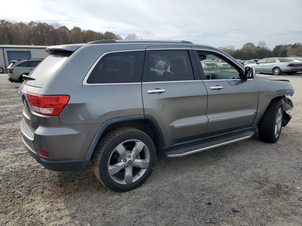 2012 Jeep Grand Cherokee VIN 1C4RJFBG4CC302668 Copart auction photo, front end / undercarriage damage thumbnail 3