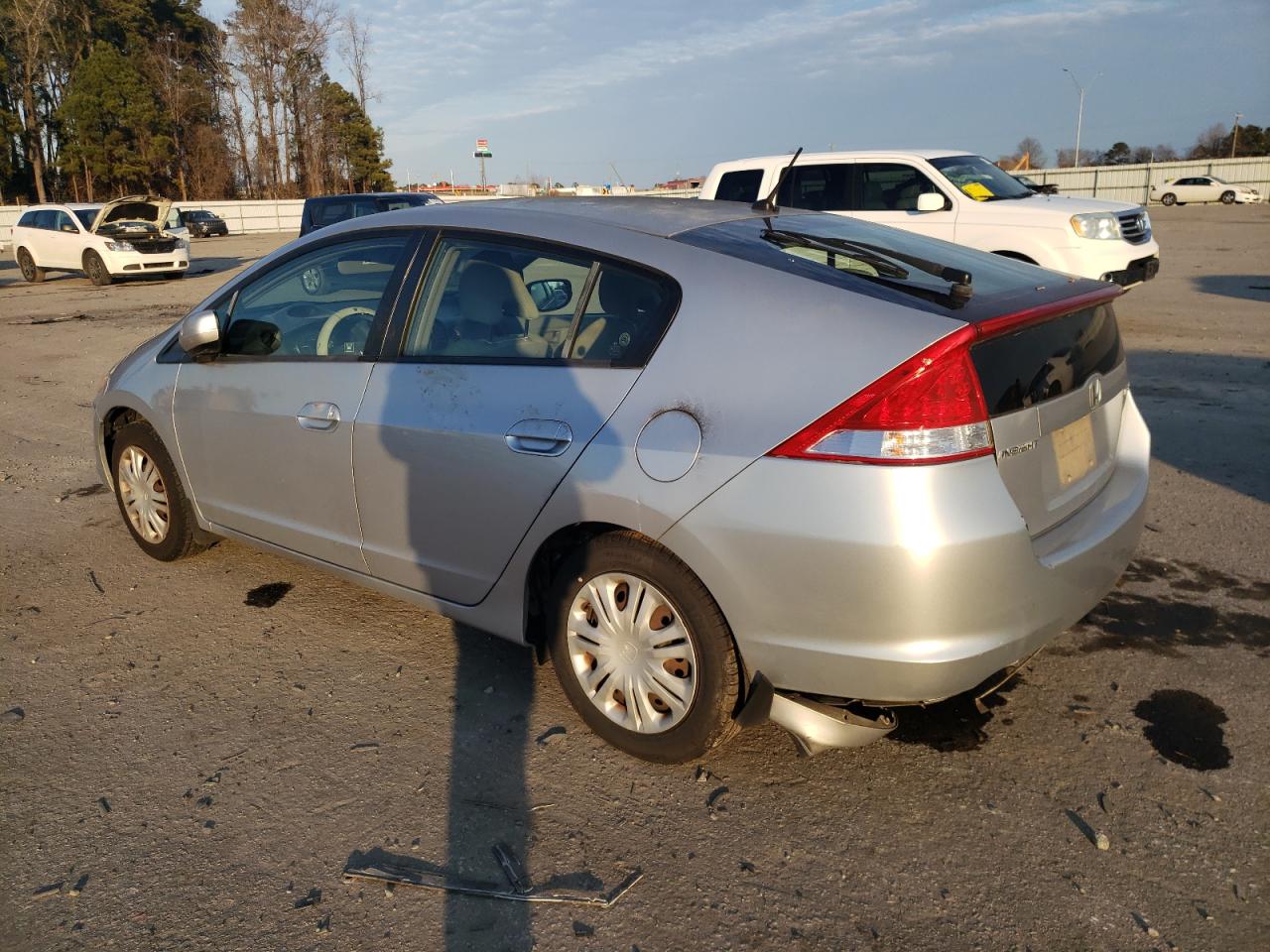 2010 Honda Insight VIN JHMZE2H54AS033544 Copart auction photo, all over / undercarriage damage thumbnail 2