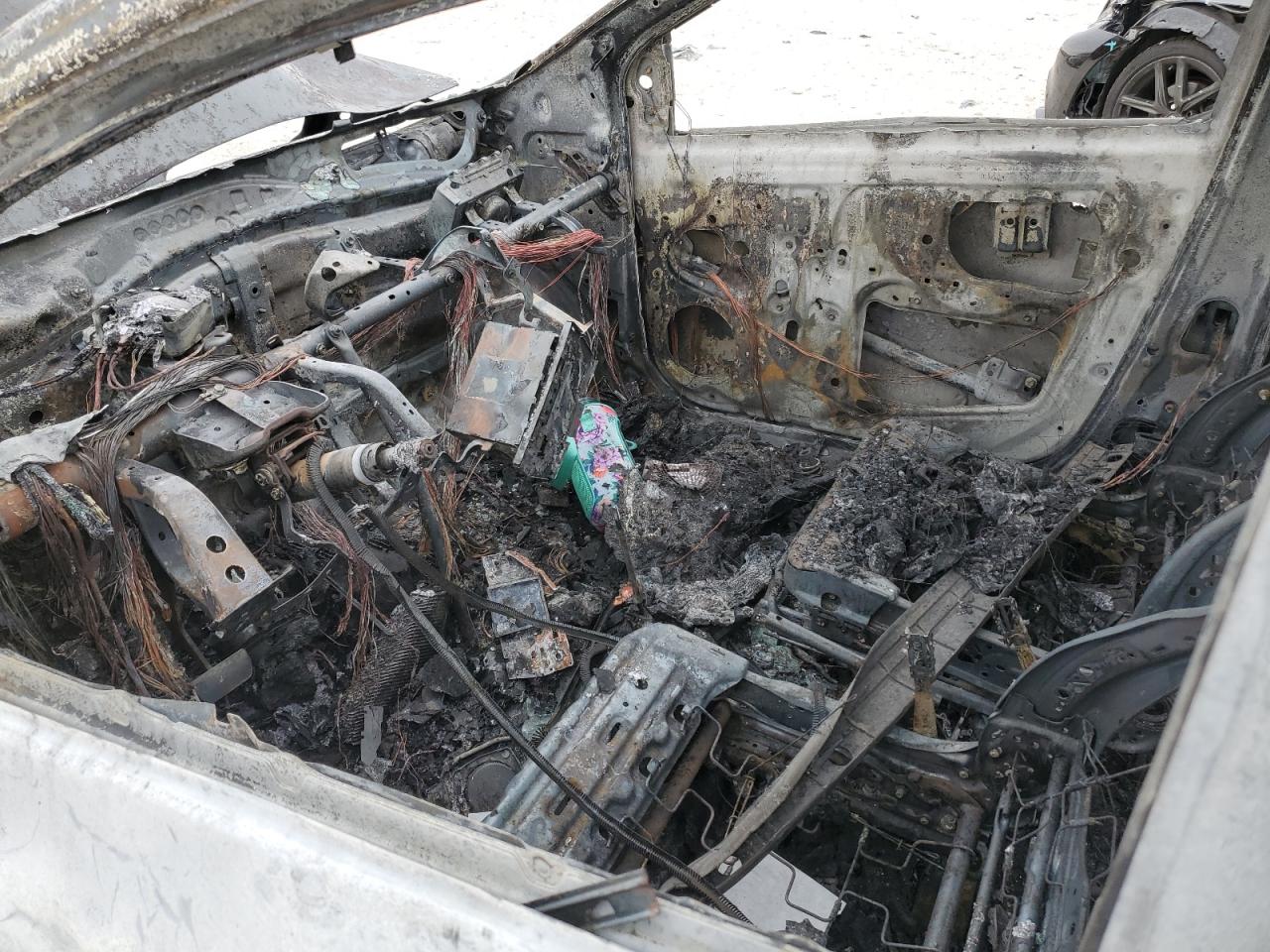 2009 Toyota Yaris VIN JTDBT903794055243 Copart auction photo, burn damage thumbnail 7