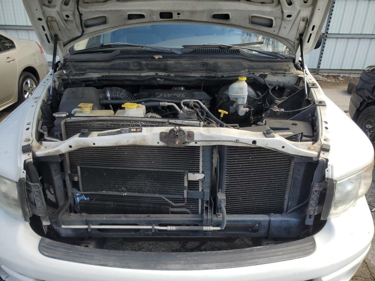 2005 Dodge RAM VIN 1D7HU18D05S117583 Copart auction photo, rear end damage thumbnail 11