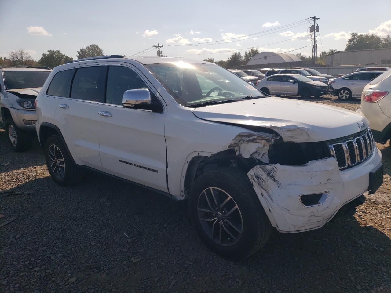 2017 Jeep Grand Cherokee VIN 1C4RJFBG1HC760689 Copart auction photo, side / front end damage thumbnail 4