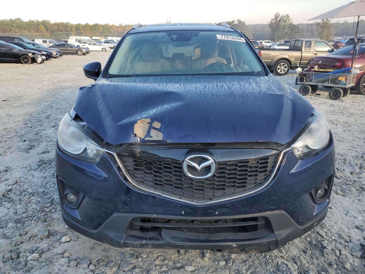 2014 Mazda CX-5 VIN JM3KE4DY7E0312493 Copart auction photo, side / front end damage thumbnail 5