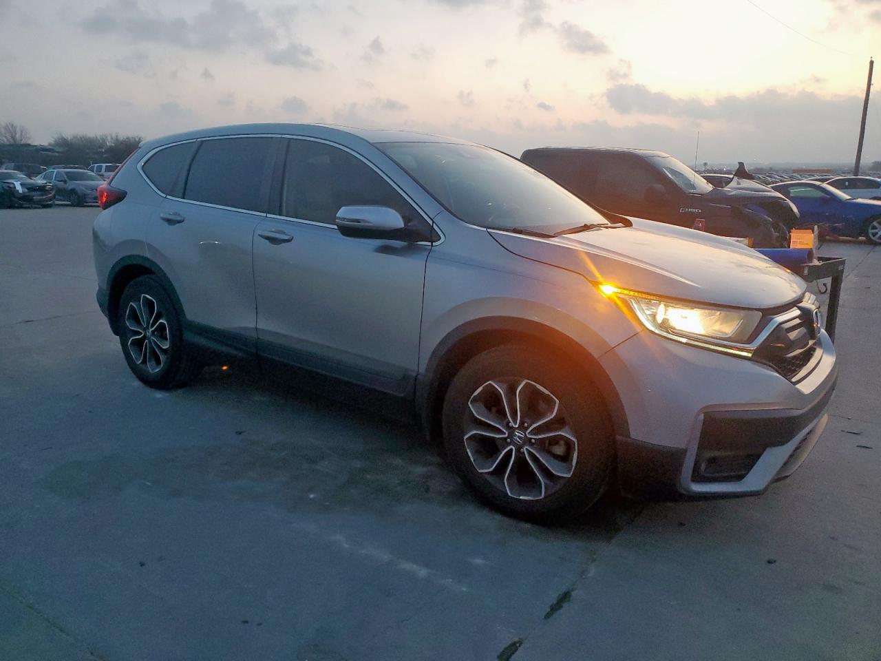 2020 Honda CR-V VIN 2HKRW1H86LH424070 Copart auction photo, hail / minor dent/scratches damage thumbnail 4