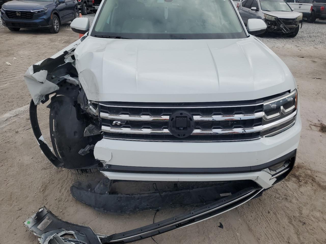 2019 Volkswagen Atlas VIN 1V2YR2CA7KC603214 Copart auction photo, front end / side damage thumbnail 12