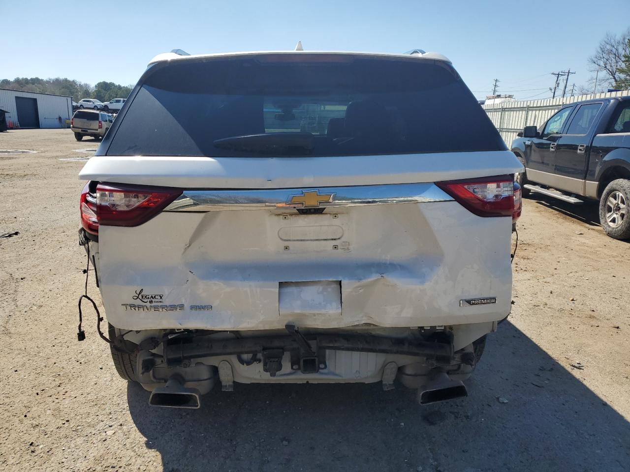 2018 Chevrolet Traverse VIN 1GNEVJKW2JJ160639 Copart auction photo, rear end / minor dent/scratches damage thumbnail 6