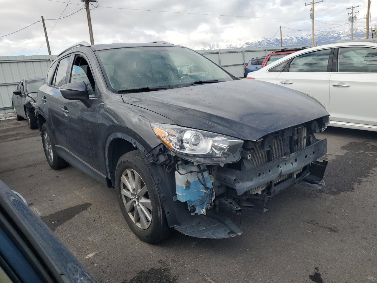 2016 Mazda CX-5 VIN JM3KE4CY6G0915441 Copart auction photo, all over damage thumbnail 4