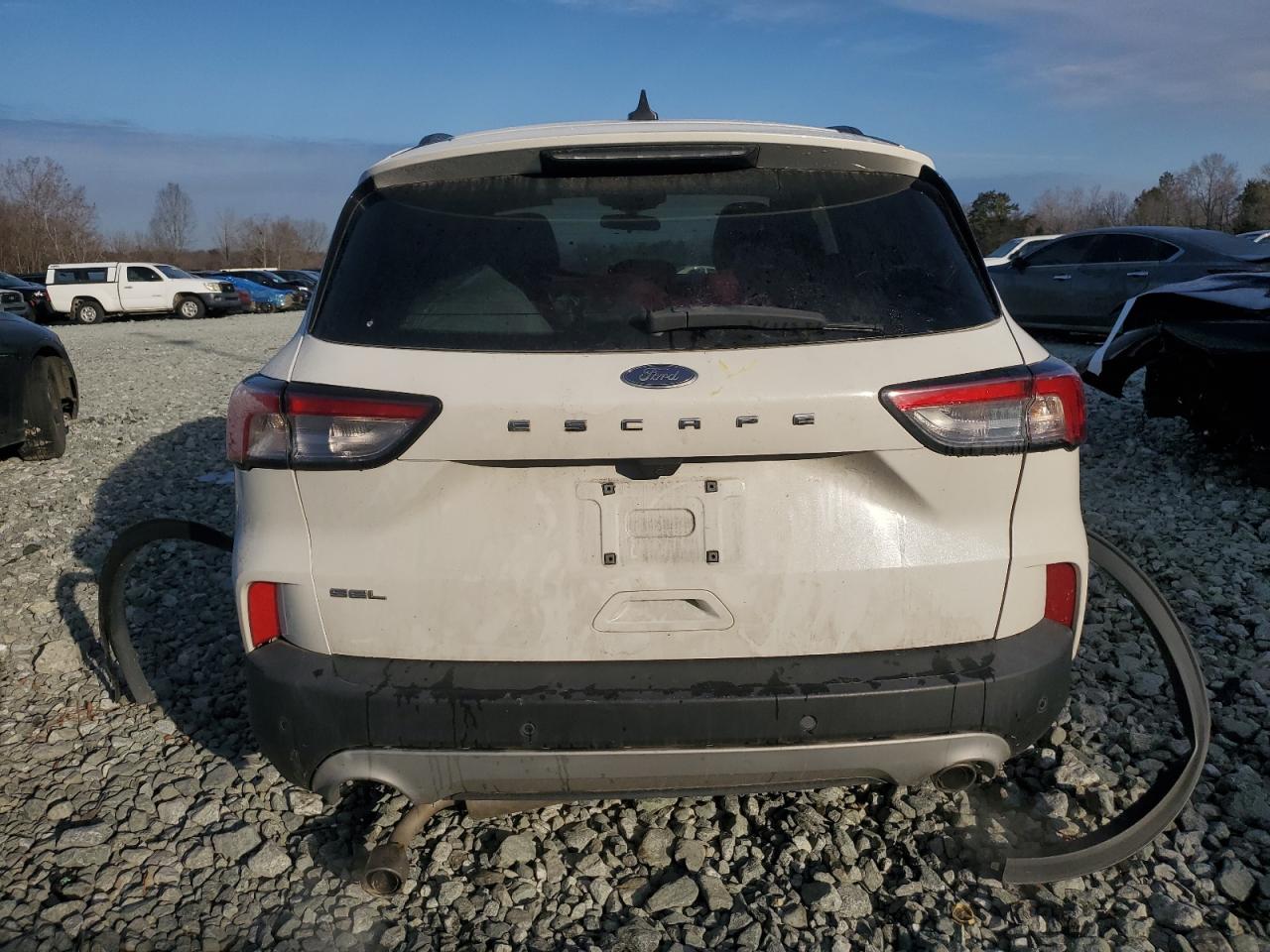 2021 Ford Escape VIN 1FMCU0H69MUB32128 Copart auction photo, all over damage thumbnail 6