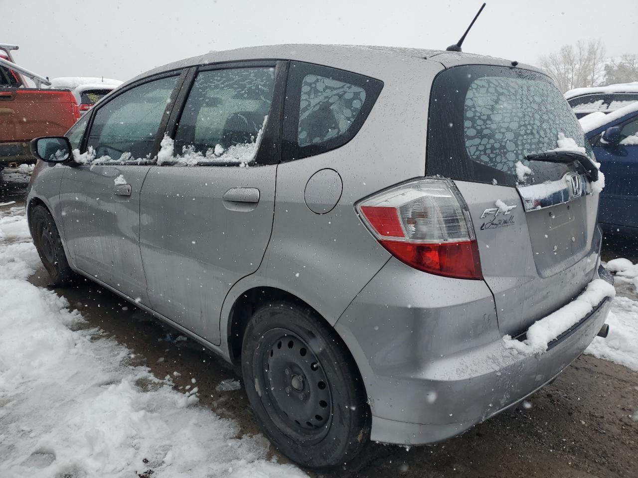 2010 Honda Fit VIN JHMGE8G21AS015777 Copart auction photo, side / rear end damage thumbnail 2