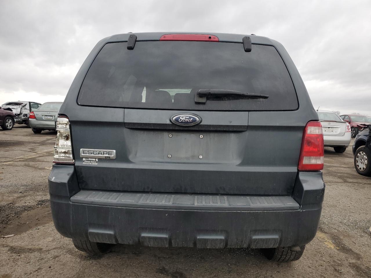 2009 Ford Escape VIN 1FMCU03G09KA63137 Copart auction photo, side / rear end damage thumbnail 6