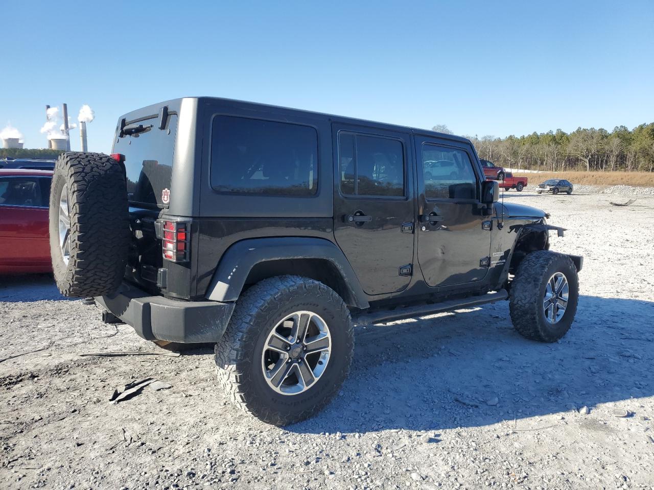 2015 Jeep Wrangler VIN 1C4HJWDG2FL692957 Copart auction photo, front end / minor dent/scratches damage thumbnail 3