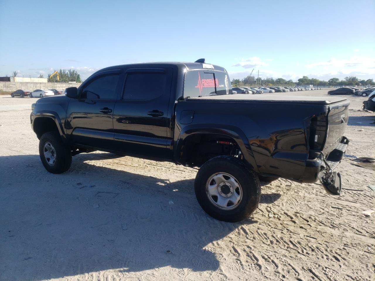 2021 Toyota Tacoma VIN 5TFAZ5CNXMX112722 Copart auction photo, rear end / minor dent/scratches damage thumbnail 2