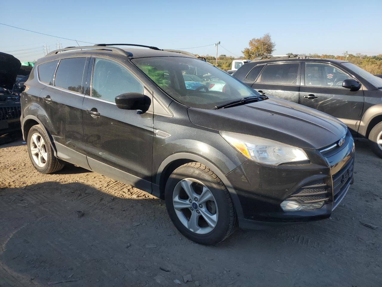 2014 Ford Escape VIN 1FMCU0GX0EUB25726 Copart auction photo, all over damage thumbnail 4