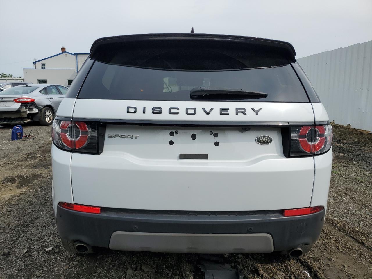 2018 Land Rover Discovery sport VIN SALCP2RXXJH754748 Copart auction photo, undercarriage / minor dent/scratches damage thumbnail 6