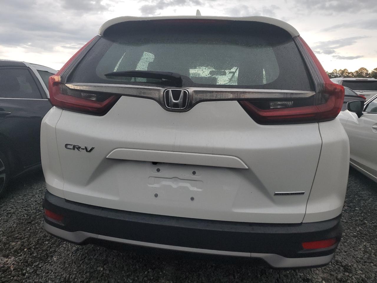 2021 Honda CR-V VIN 7FARW1H77ME015703 Copart auction photo, water/flood damage thumbnail 6