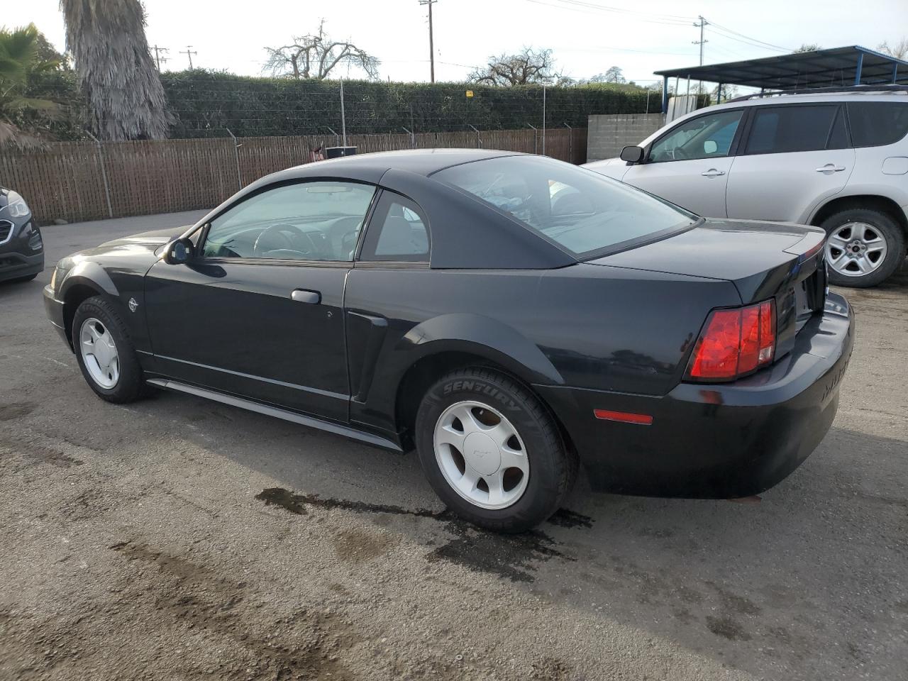 1999 Ford Mustang VIN 1FAFP4044XF218987 Copart auction photo, minor dent/scratches damage thumbnail 2