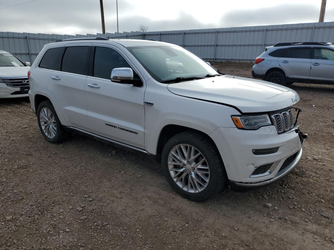 2017 Jeep Grand Cherokee VIN 1C4RJFJTXHC963613 Copart auction photo, front end / side damage thumbnail 4