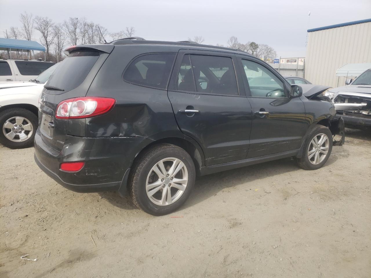 2012 Hyundai Santa Fe VIN 5XYZKDAG8CG095880 Copart auction photo, all over damage thumbnail 3