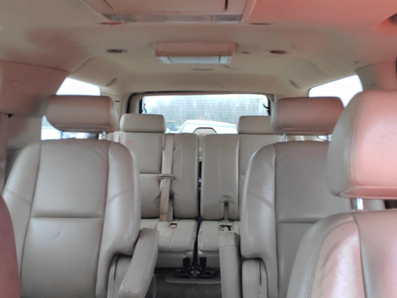 2009 Chevrolet Suburban VIN 1GNFK36359R214019 Copart auction photo, burn damage thumbnail 10