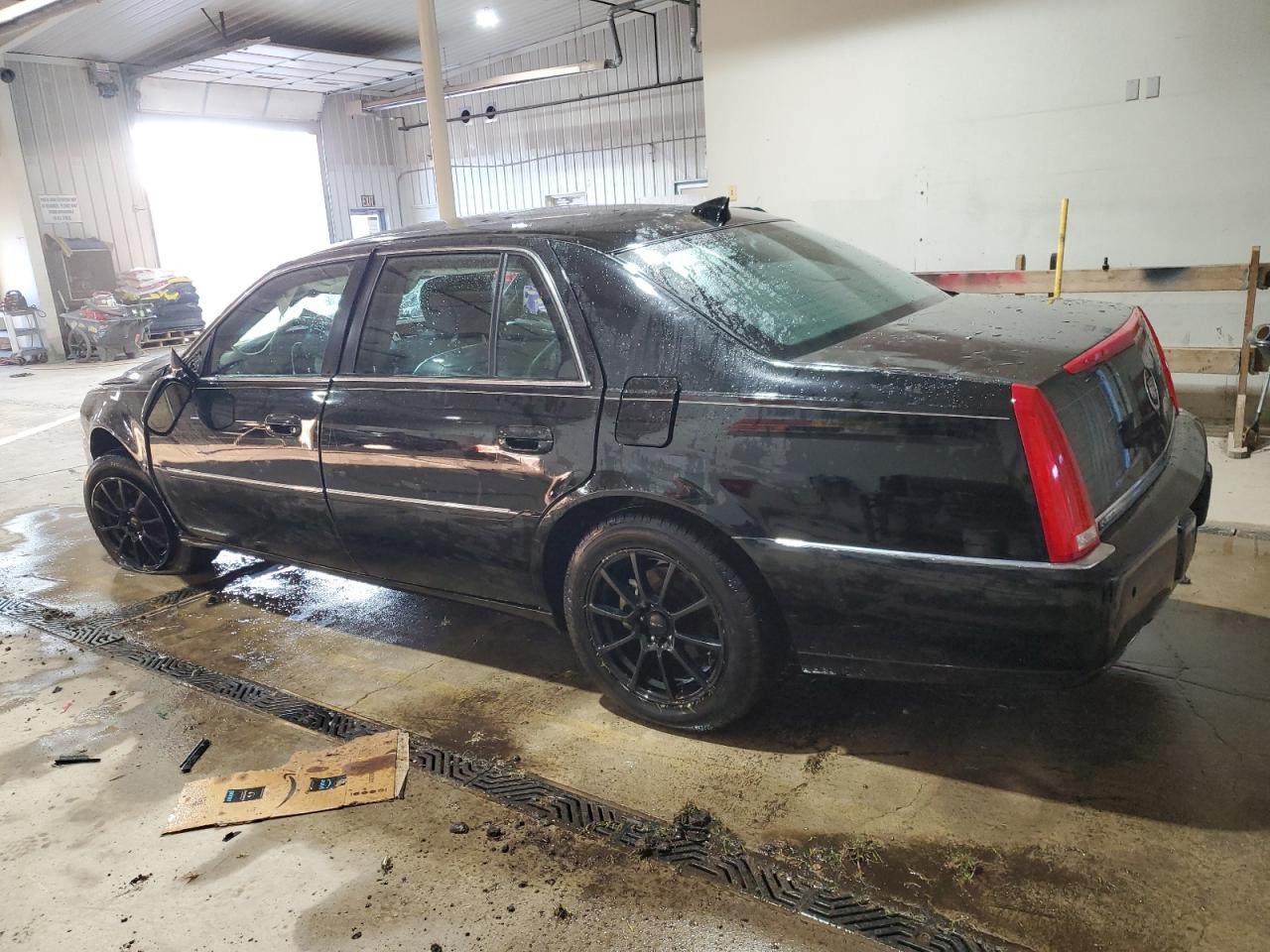 2009 Cadillac DTS VIN 1G6KD57YX9U117924 Copart auction photo, front end / side damage thumbnail 2