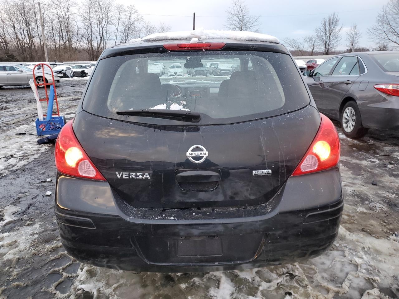 2012 Nissan Versa VIN 3N1BC1CP0CK287824 Copart auction photo, side damage thumbnail 6