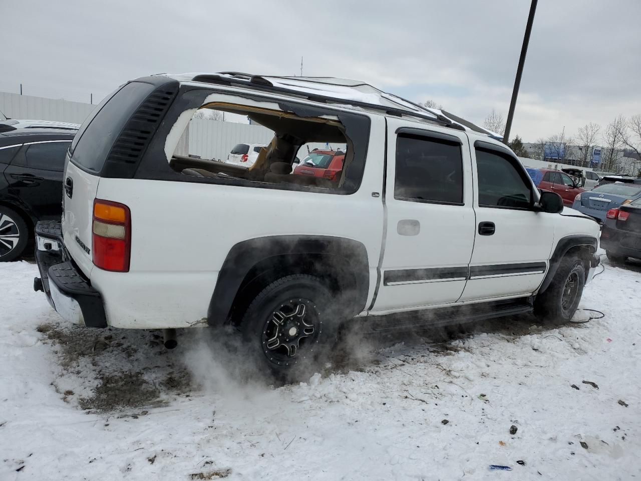2002 Chevrolet Suburban VIN 3GNEC16Z12G274483 Copart auction photo, side / front end damage thumbnail 3