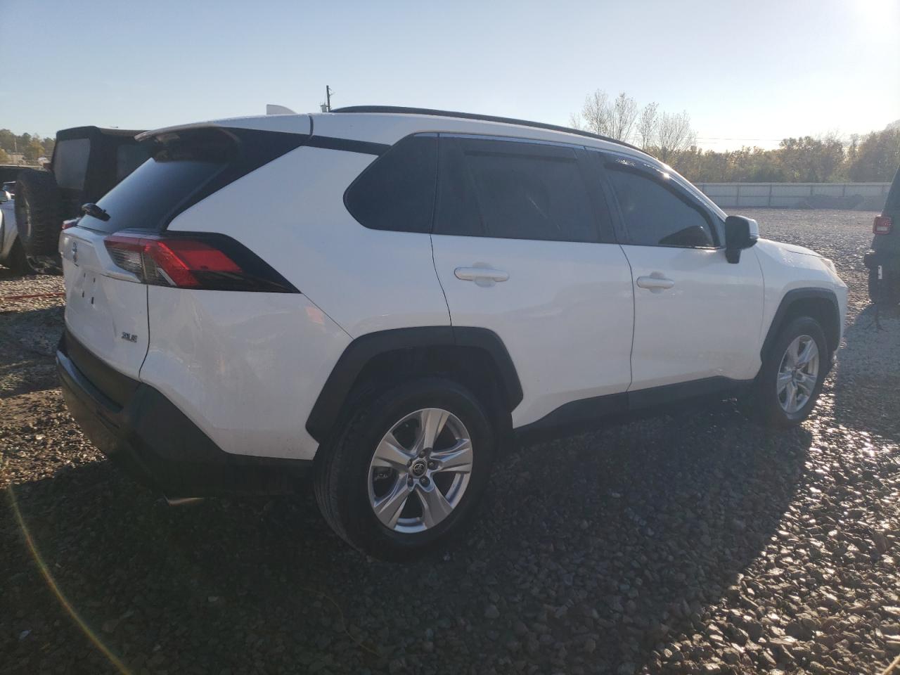 2021 Toyota RAV 4 VIN 2T3W1RFV5MC168881 Copart auction photo, side / front end damage thumbnail 3