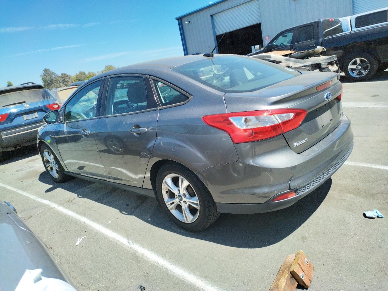 2014 Ford Focus VIN 1FADP3F24EL351030 Copart auction photo, front end / minor dent/scratches damage thumbnail 2