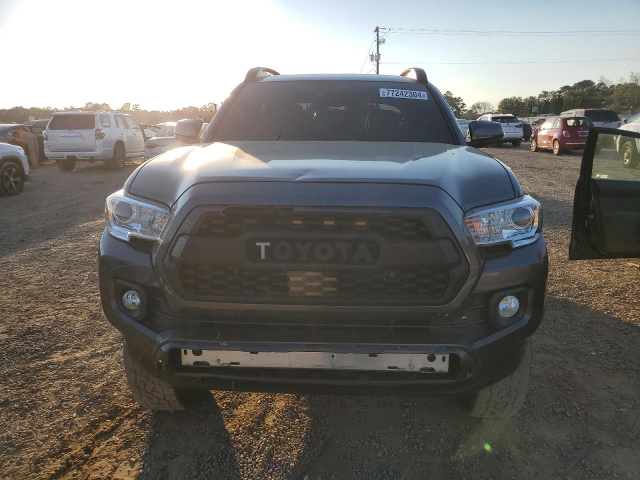 2021 Toyota Tacoma VIN 5TFAZ5CN9MX104031 Copart auction photo, front end / side damage thumbnail 5