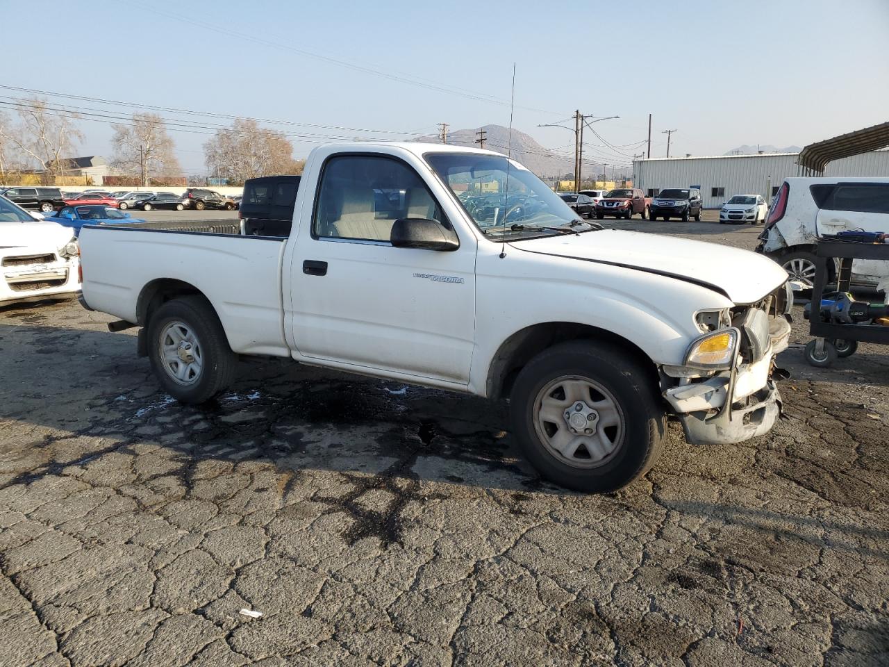 2001 Toyota Tacoma VIN 5TENL42N01Z768799 Copart auction photo, front end damage thumbnail 4