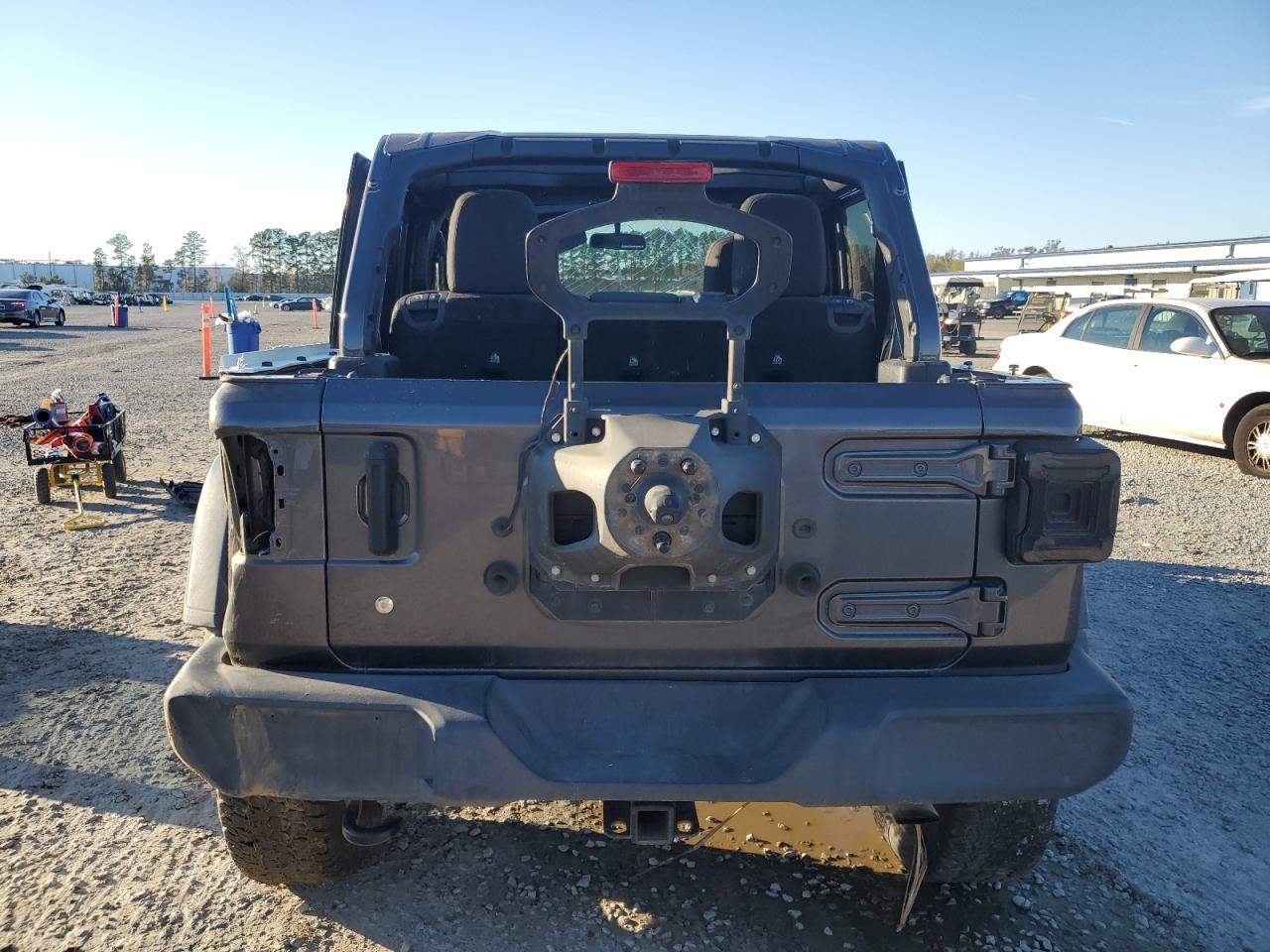 2020 Jeep Wrangler VIN 1C4HJXDN4LW114910 Copart auction photo, all over damage thumbnail 6