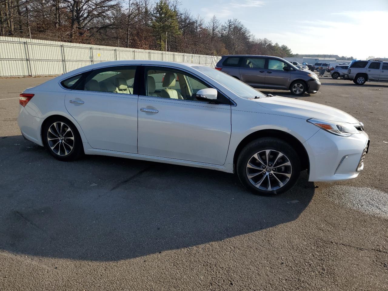 2016 Toyota Avalon VIN 4T1BK1EB5GU233311 Copart auction photo, rear end / side damage thumbnail 4