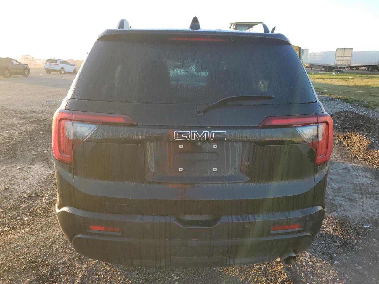 2021 GMC Acadia VIN 1GKKNKLAXMZ210430 Copart auction photo, undercarriage / minor dent/scratches damage thumbnail 6