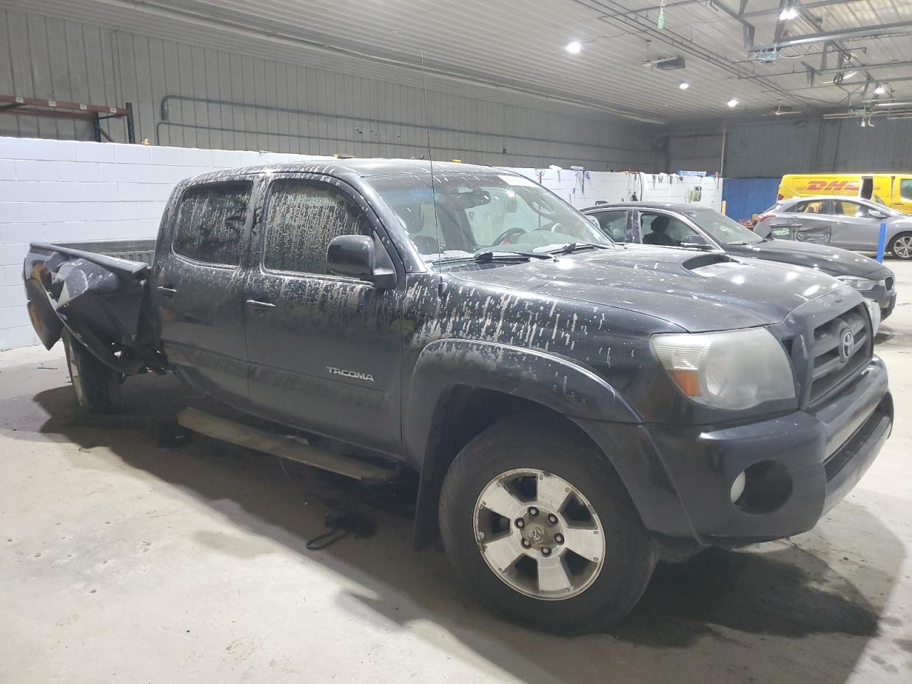 2010 Toyota Tacoma VIN 3TMKU4HN7AM024072 Copart auction photo, all over / undercarriage damage thumbnail 4