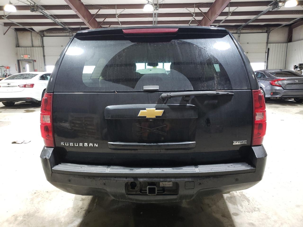 2009 Chevrolet Suburban VIN 1GNFK26319R210947 Copart auction photo, all over damage thumbnail 6