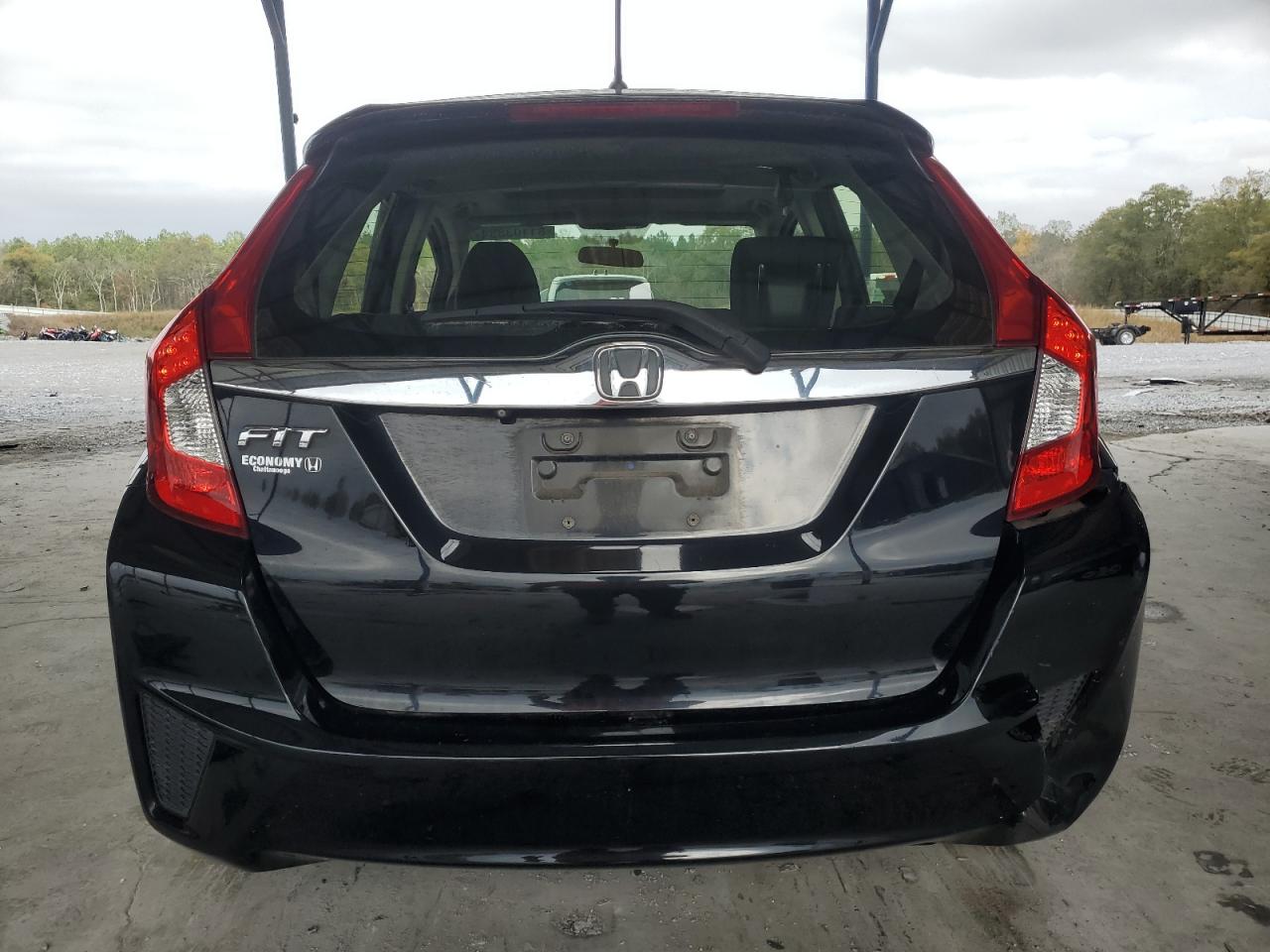 2016 Honda Fit VIN JHMGK5H77GX001346 Copart auction photo, side / front end damage thumbnail 6
