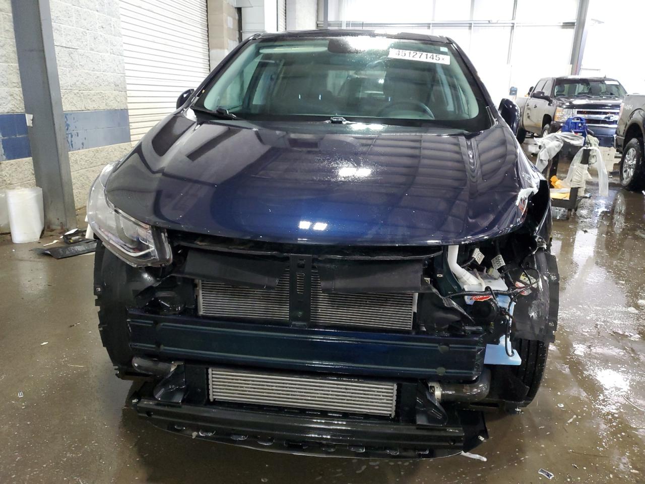 2021 Chevrolet Trax VIN KL7CJNSB2MB316352 Copart auction photo, front end / side damage thumbnail 5