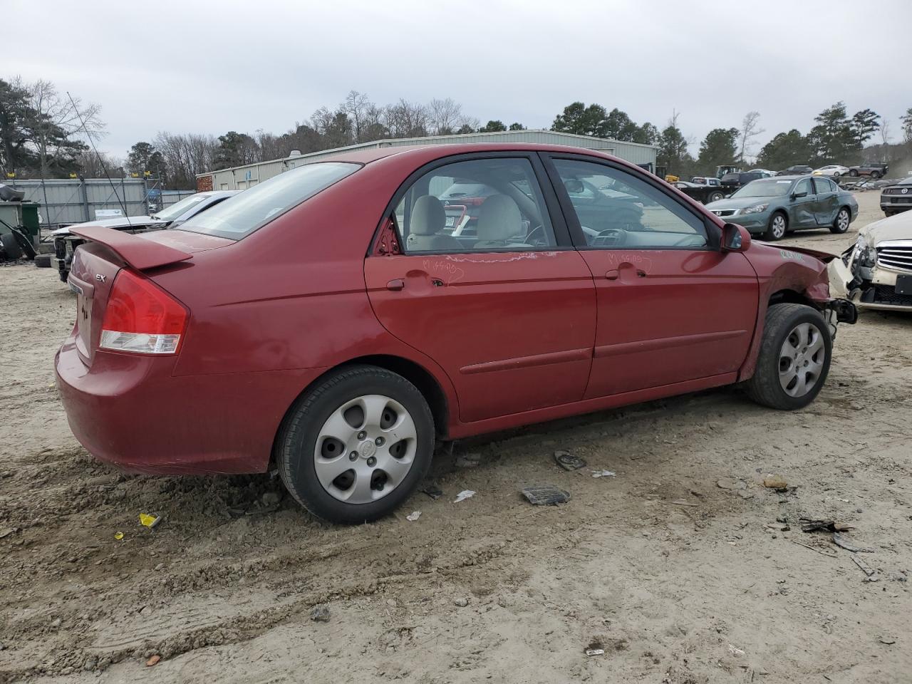 2009 KIA Spectra VIN KNAFE221695616392 Copart auction photo, front end / minor dent/scratches damage thumbnail 3