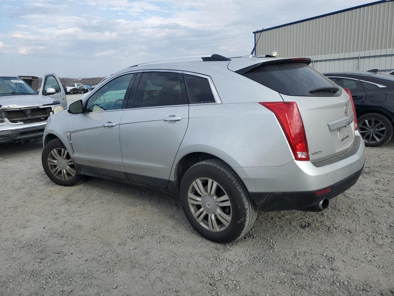 2012 Cadillac SRX VIN 3GYFNAE34CS578825 Copart auction photo, side / minor dent/scratches damage thumbnail 2