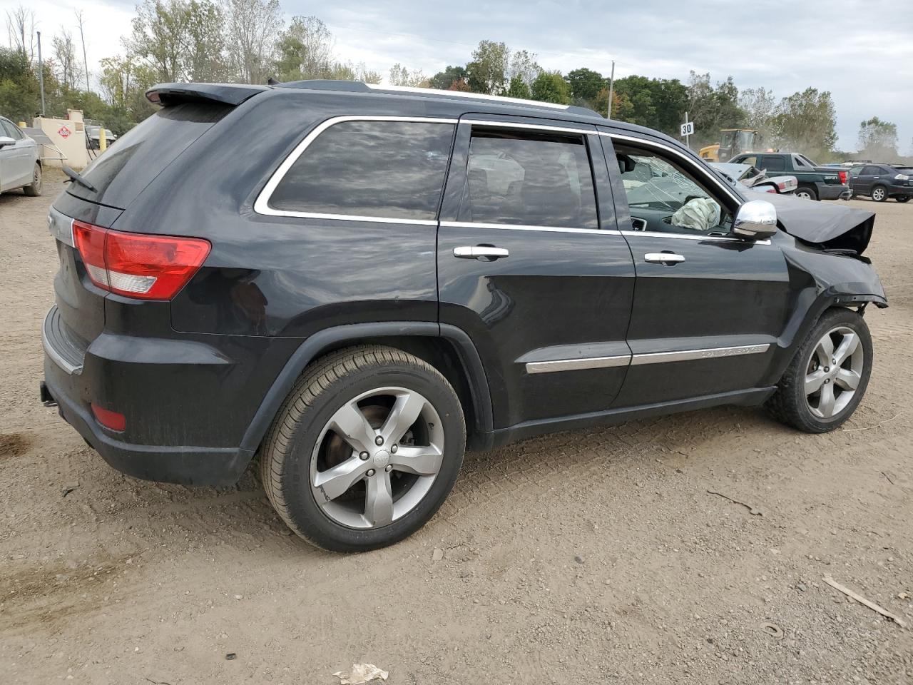 2013 Jeep Grand Cherokee VIN 1C4RJFCG9DC523957 Copart auction photo, front end / minor dent/scratches damage thumbnail 3