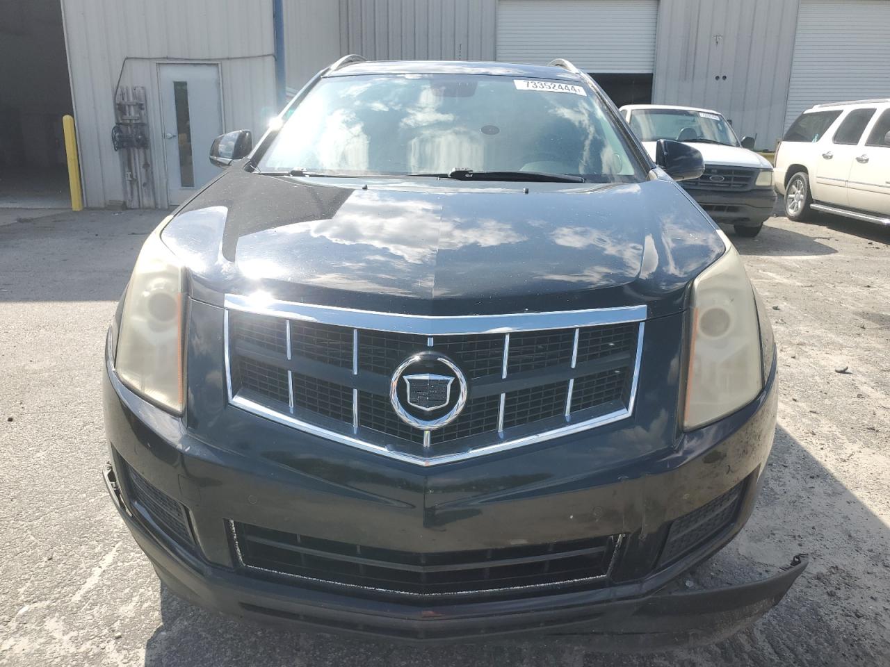 2010 Cadillac SRX VIN 3GYFNAEYXAS599798 Copart auction photo, front end damage thumbnail 5