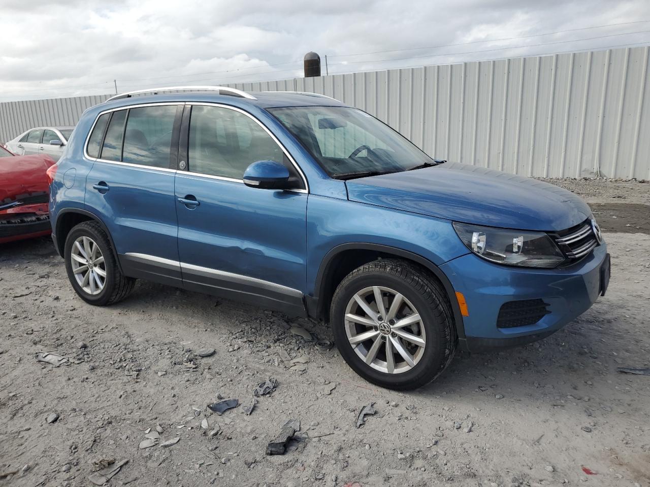 2017 Volkswagen Tiguan VIN WVGRV7AX1HW506082 Copart auction photo, rear end damage thumbnail 4