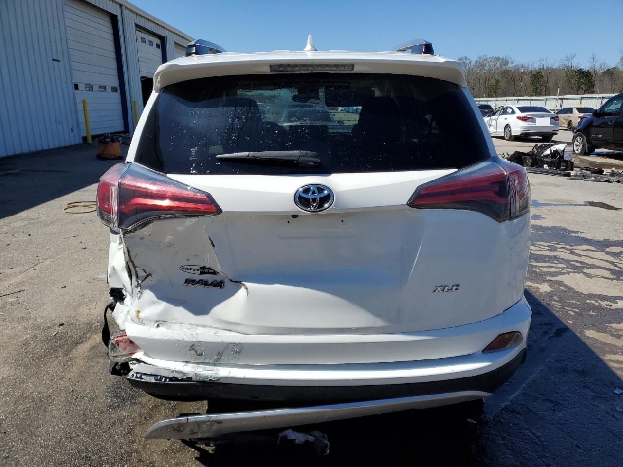 2017 Toyota RAV 4 VIN JTMWFREV8HJ110155 Copart auction photo, rear end damage thumbnail 6